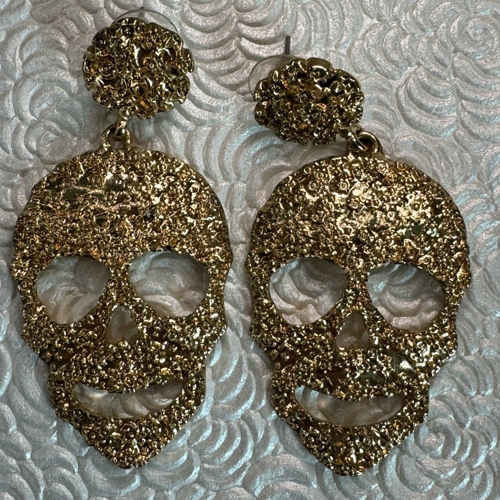 Gold skull earrings
